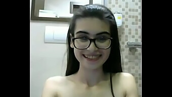 18-Year-Old Cam Girl Shows Off Her Tiny Tits And Shaved Pussy