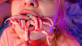 Mouth Fetish: Watch As A Woman Bites Into An Octopus While Wearing Braces